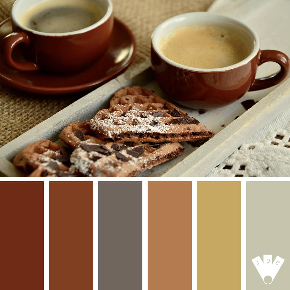 Color palette à partir d'une photo de 2 tasses de café avec des gaufres en forme de cœur avec du chocolat.