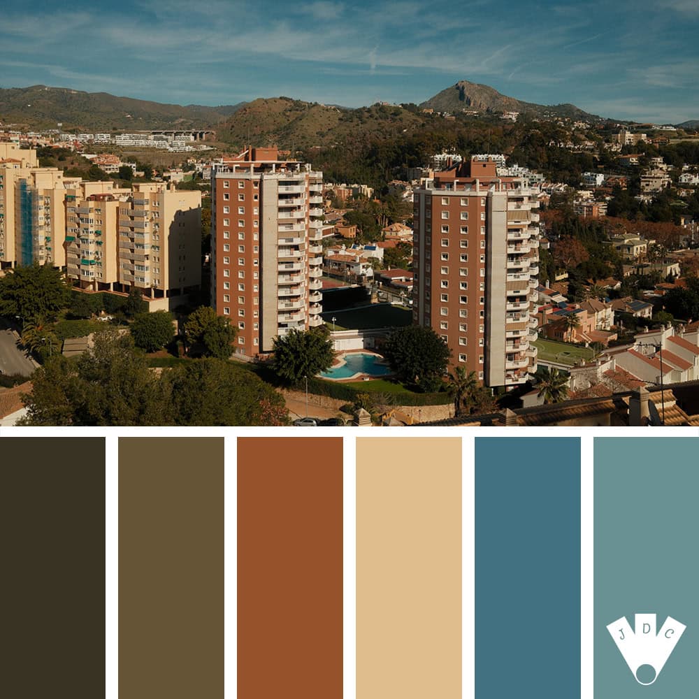 Palette de couleurs inspirée de la ville de Malaga, avec des tons terre cuite, beige sable, vert olive et bleu méditerranéen.